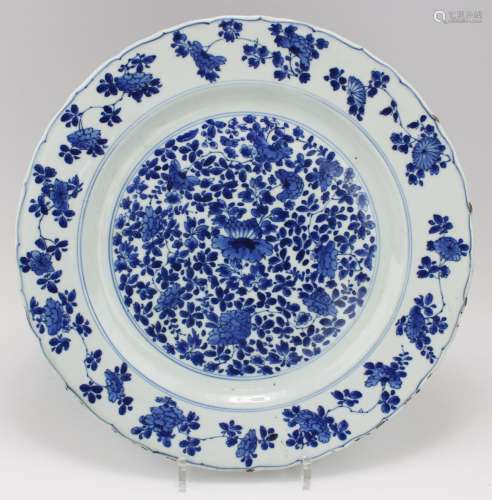 A blue and white floral charger