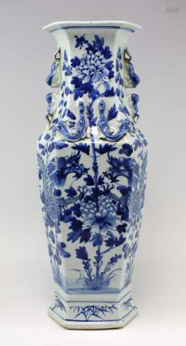 A large blue and white dragon vase