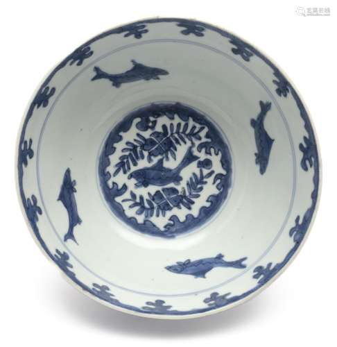 A blue and white bowl with interior fish pond pattern