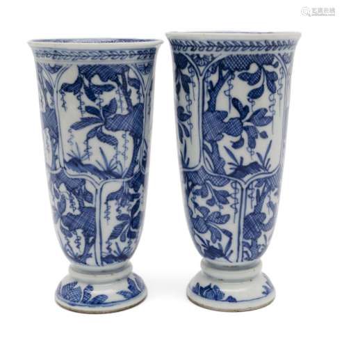 Two blue and white beaker vases