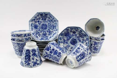 Nine octagonal blue and white cups and saucers