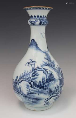 A blue and white bottle vase