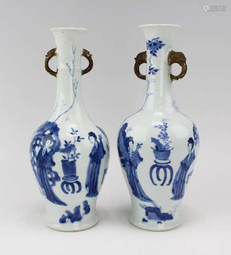 Two blue and white vases with Long Eliza figures