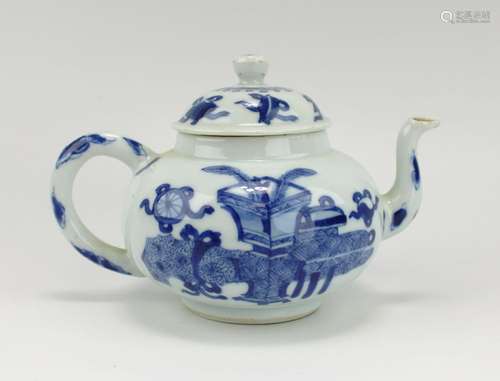 A blue and white teapot with valuables