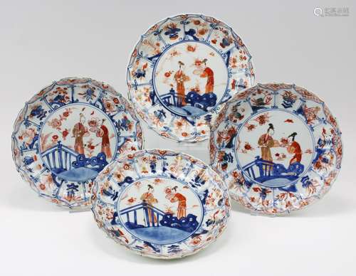 Four Chinese imari plates with two figures