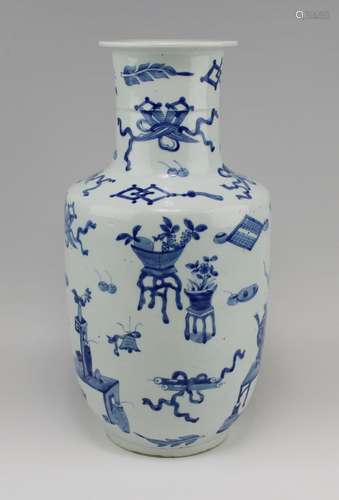 A blue and white rouleau vase with valuables