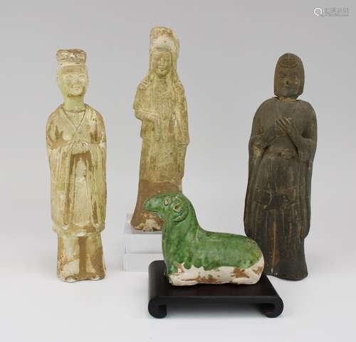 Four terracotta funerary figures; 3 figures and a goat