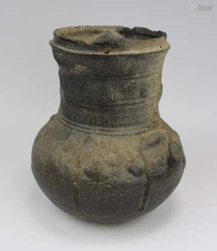 A black pottery funerary jar