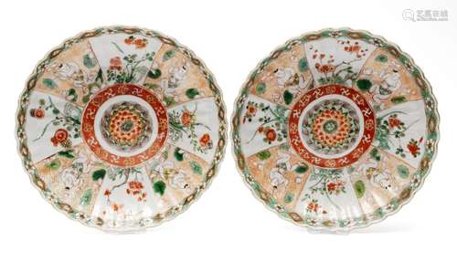 A pair of famille verte plates with boys-pattern