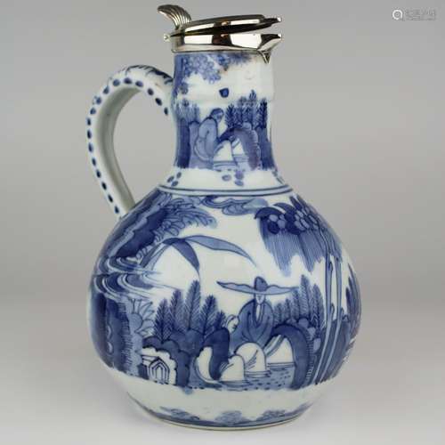 A Japanese Arita blue and white pitcher with later Dutch sil...