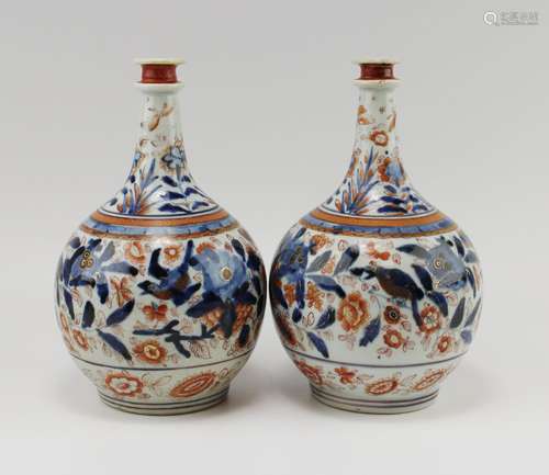 A pair of Japanese imari porcelain bottles