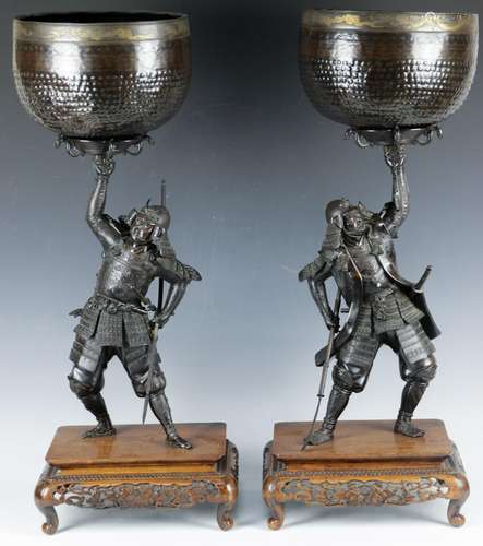 A pair of Japanese bronze figural samurai gong stands