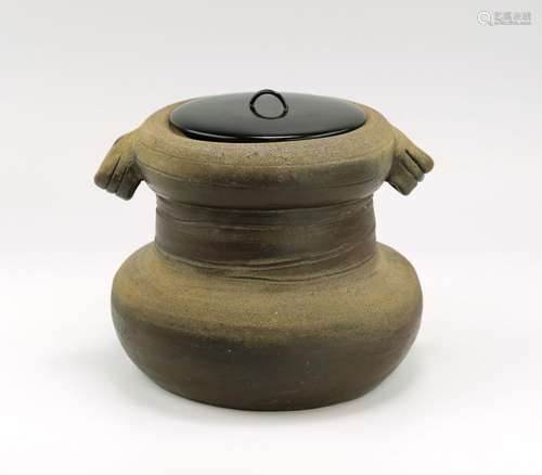 A japanese ceramic jar-vase