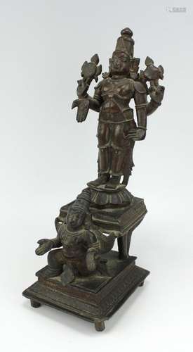 A bronze Viṣṇu standing on Garuḍa