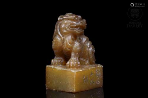 A carved stamp with lion, 20th century