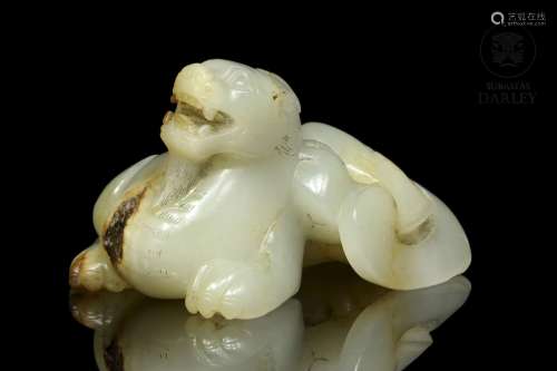 Figure of "Lion" in carved jade.