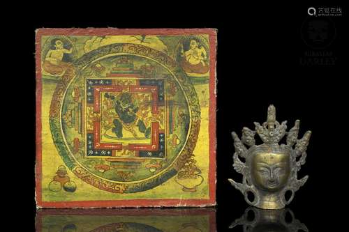 Thangka and Buddha's head, 20th century