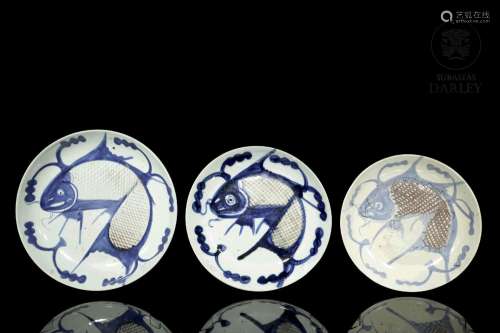 Three porcelain "fish" dishes, Asia, 19th century