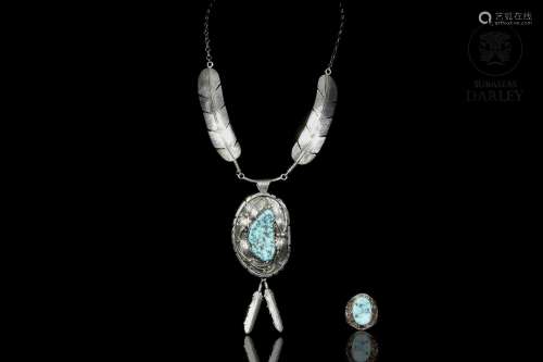 Silver and turquoise jewelry. Mark Yazzie necklace and a rin...