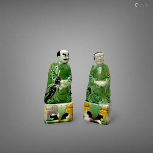 An attractive Pair of Biscuit Figures, Kangxi