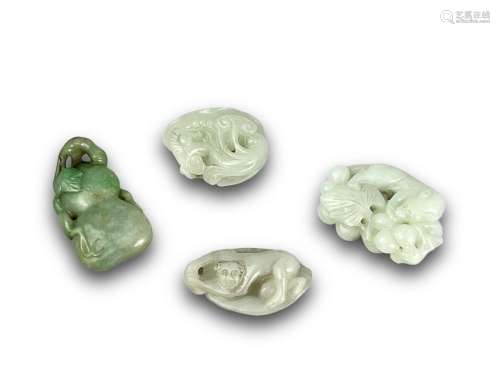 Four jade pendants, 20th century