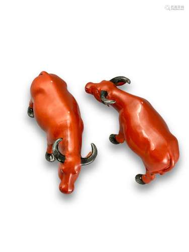 A Pair of Iron Red Buffalo, 19/20th century