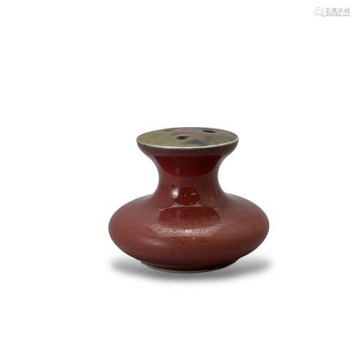A flower vase with three holes in copper-red glaze vase with...