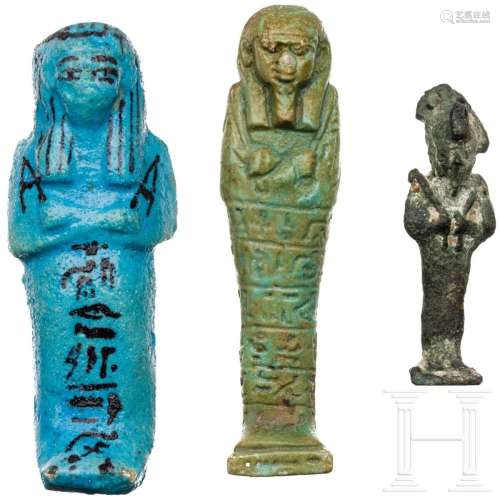 Two Ancient Egyptian faience uschebtis and a bronze Osiris s...