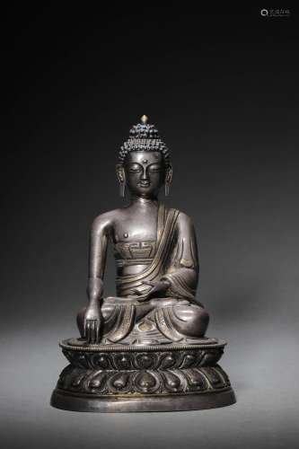 A CHINESE SILVER FIGURE OF BUDDA