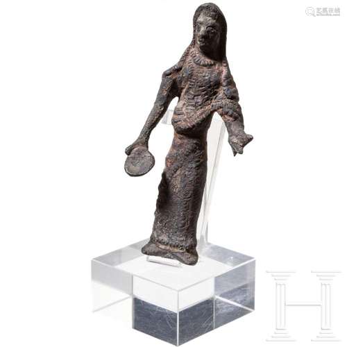 An Etruscan bronze statuette of a sacrificing woman, 4th - 2...