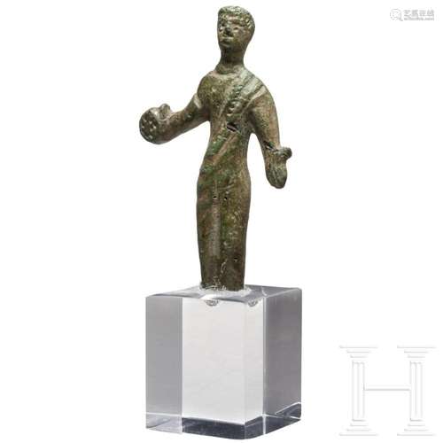 An Etruscan bronze votive statuette of a sacrificing man, 5t...