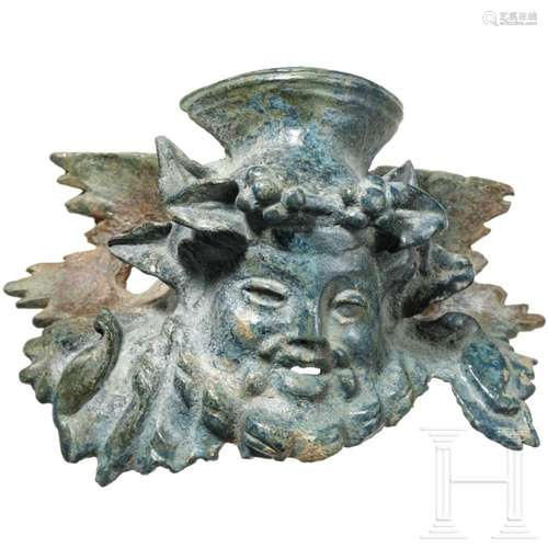 A Roman furniture fitting with the head of Bacchus, 1st - 2n...