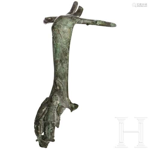 A figurally decorated Roman bronze handle, 2nd - 3rd century