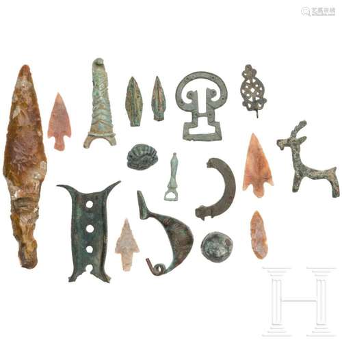 Twelve ancient bronze objects and five Neolithic stone artef...