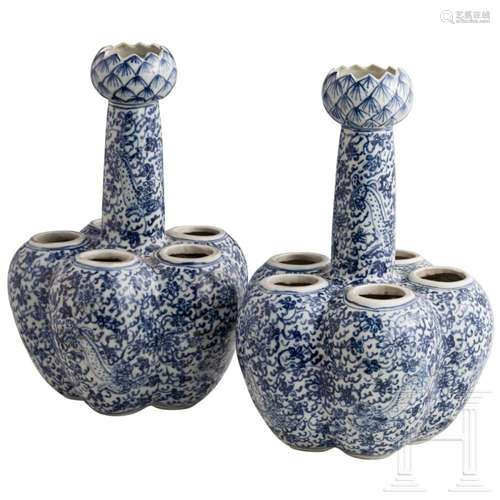 A pair of Chinese blue and white dragon tulip vases, 19th ce...