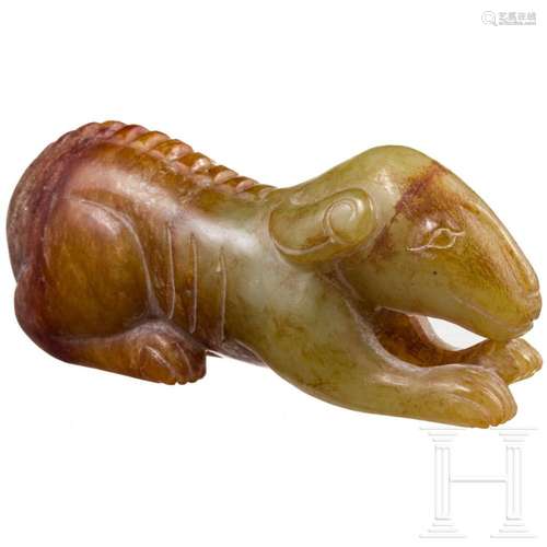 A Chinese dog figurine made of jade, 20th century