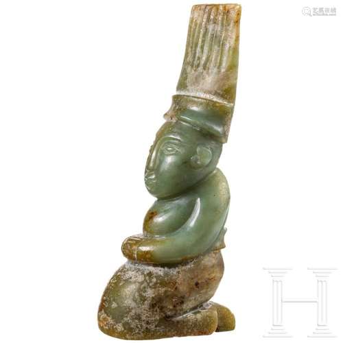 A Chinese jade figurine of a kneeling man, 20th century