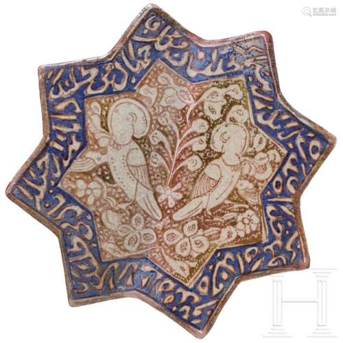 A star-shaped Iranian tile, Kashan, 13th/14th century