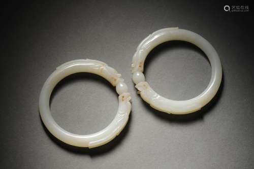 A PAIR OF QING WHITE JADE BRACELET