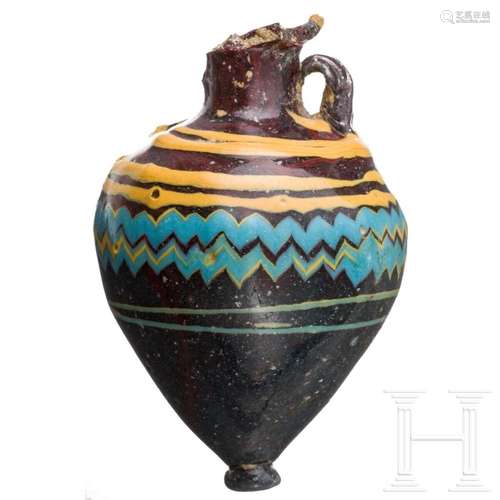 An Eastern Mediterranean glass amphoriskos, late 6th - 5th c...