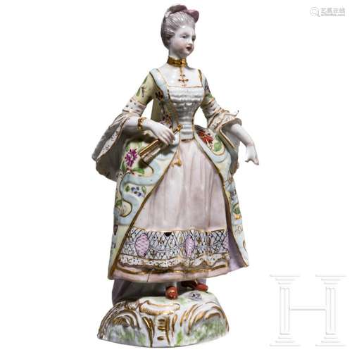 A German porcelain figure showing a Rococo lady, circa 1900