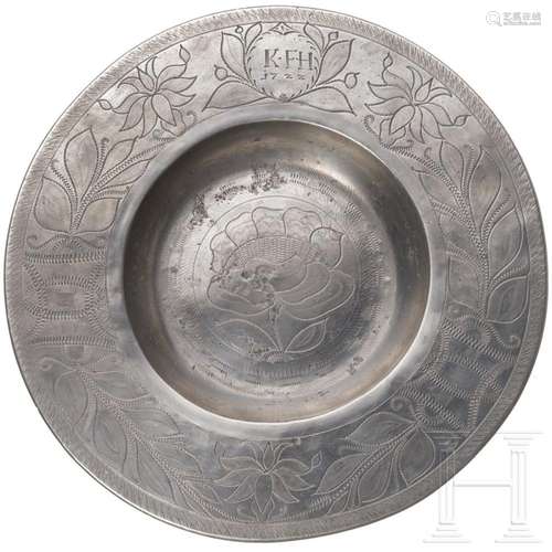 An engraved pewter broad-rim plate, Iglau, dated 1722