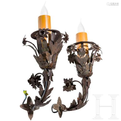 A pair of wrought-iron wall lamps, circa 1900