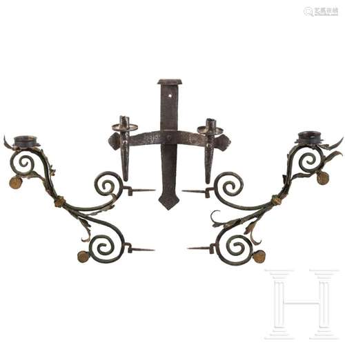 Three wrought iron lamps, probably German, early 20th centur...