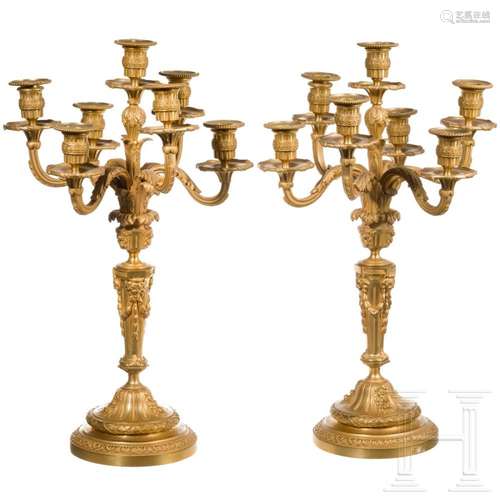 A pair of French classicist candlesticks in Louis XVI style,...