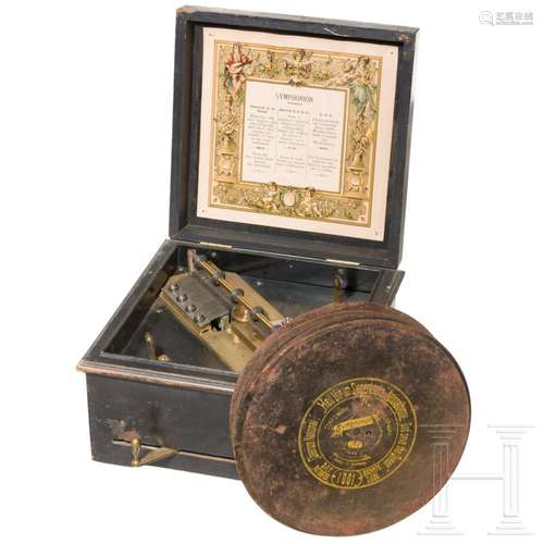 A German Symphonion music box with twelve music discs, circa...