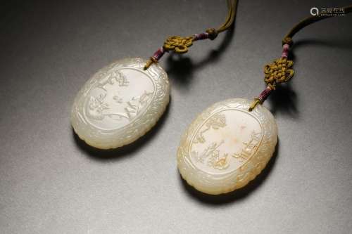 A PAIR OF QING QIANLONG PERIOD WHITE JADE POEM INSCRIBED PLA...