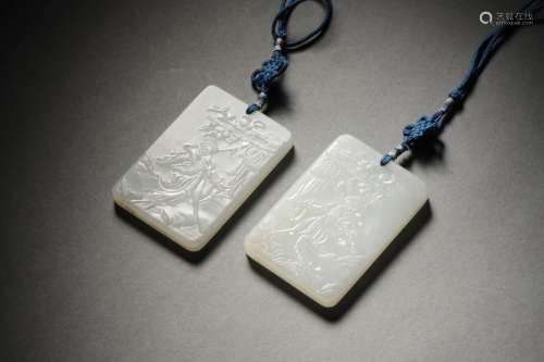 A PAIR OF QING WHITE JADE PLATES