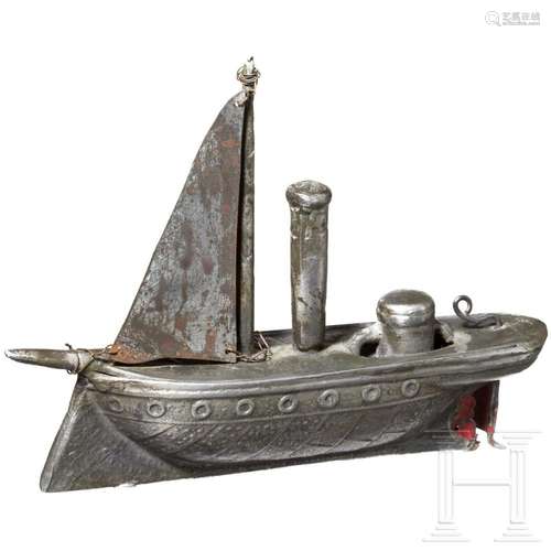 A pewter miniature sailing ship, circa 1840