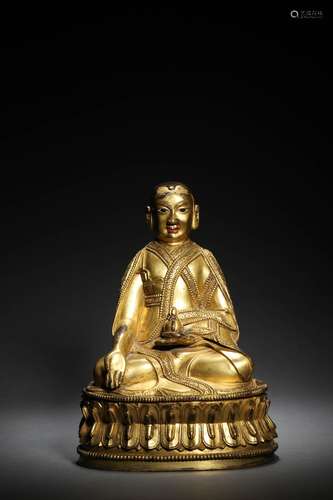 A CHINESE BRONZE  FIGURE OF BUDDA